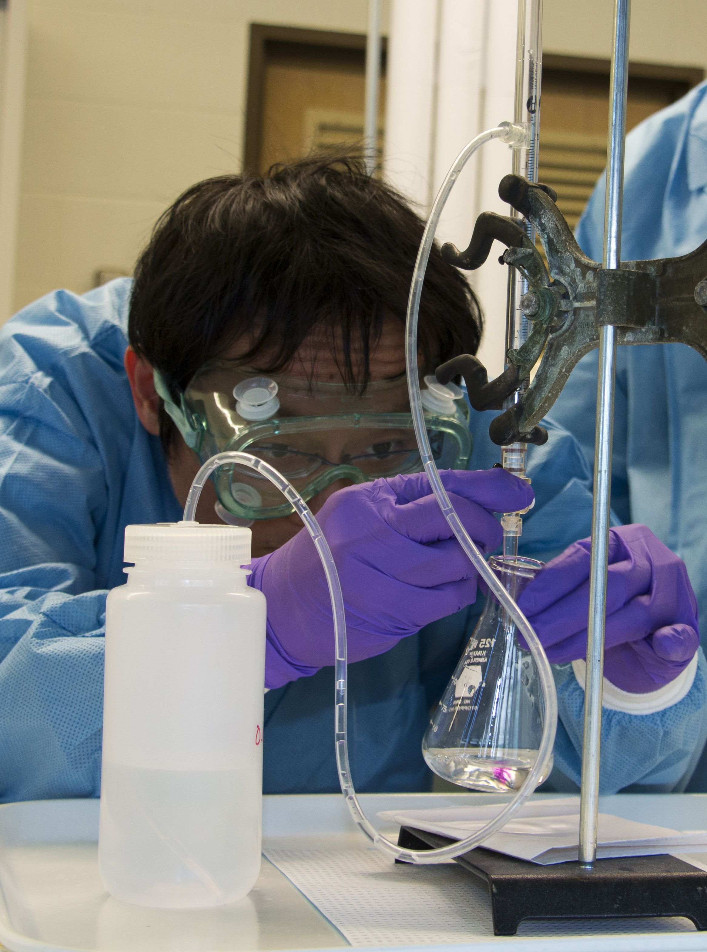 A student works in the radiochemistry lab.
