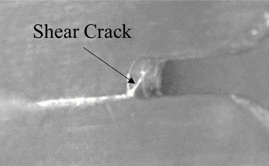 Notch tip shear crack